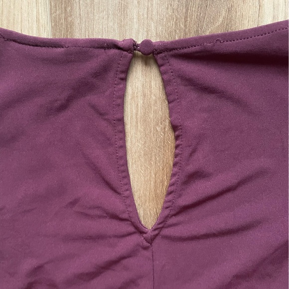 LANE BRYANT Stretchy, Wide Leg, Flutter Sleeve, Faux Wrap Jumpsuit - Picture 8 of 13